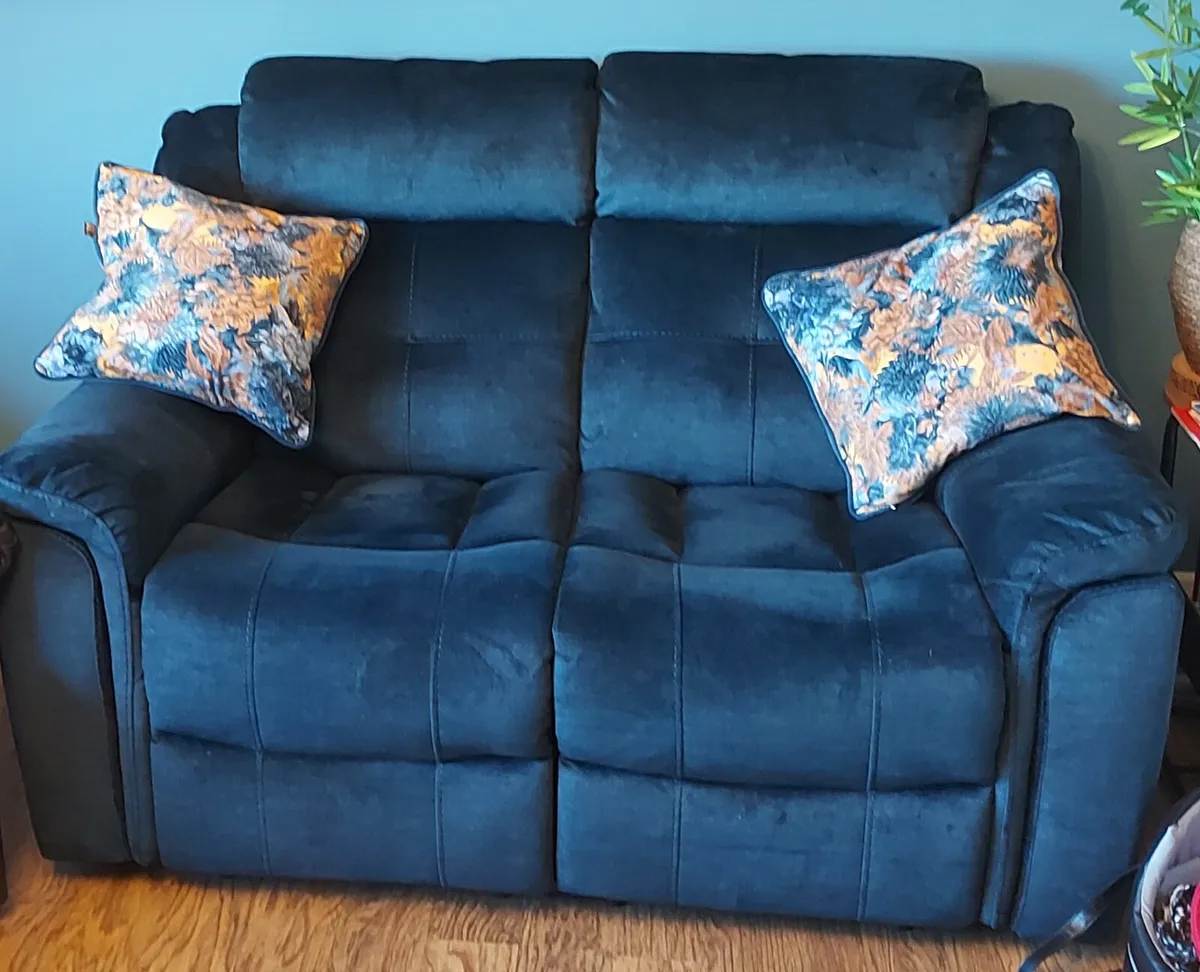 2 seater reclining teal colour couch