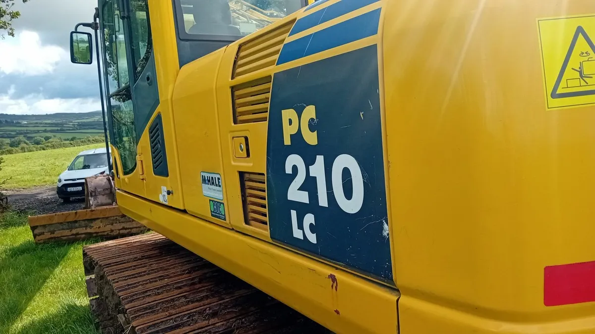 Komatsu 210 - Image 1