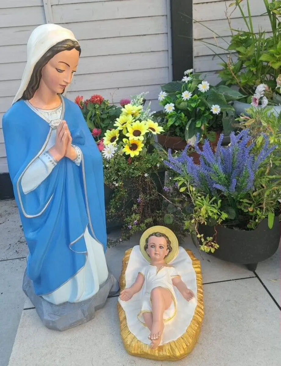 Large statues of Baby Jesus and Mother of God