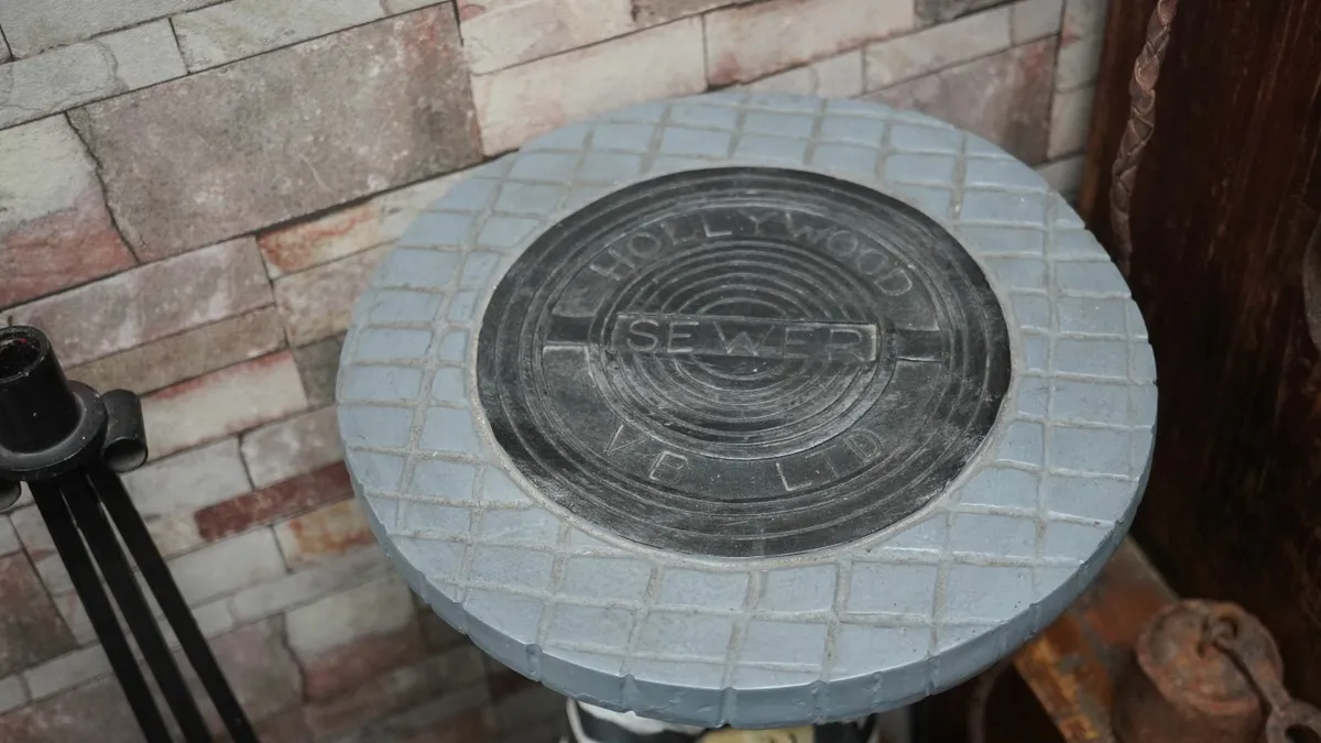 “Laurel & Hardy ‘Manhole Escape’ Side Table / Stan - Image 3