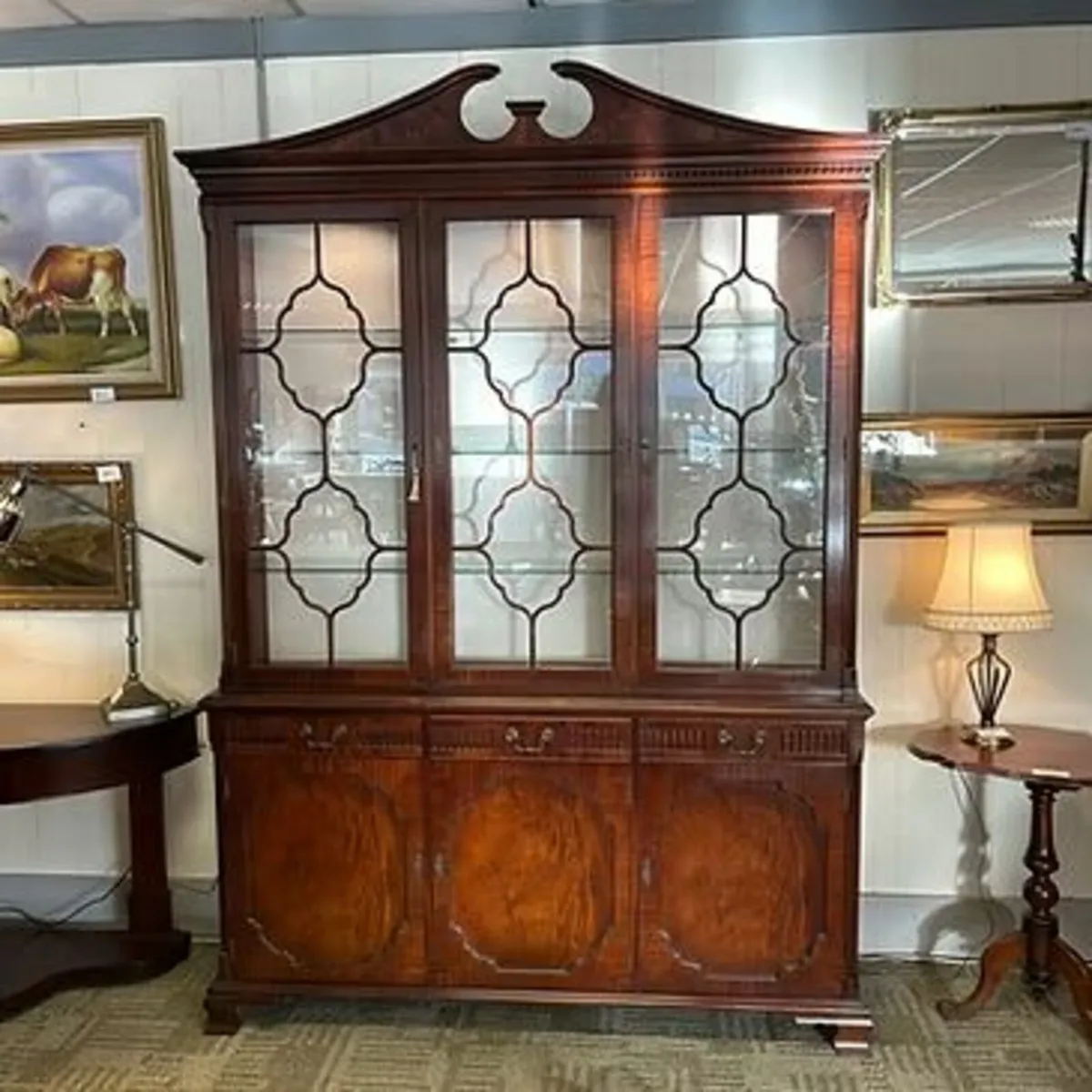 Charles Burr mahogany flamed three door display ca