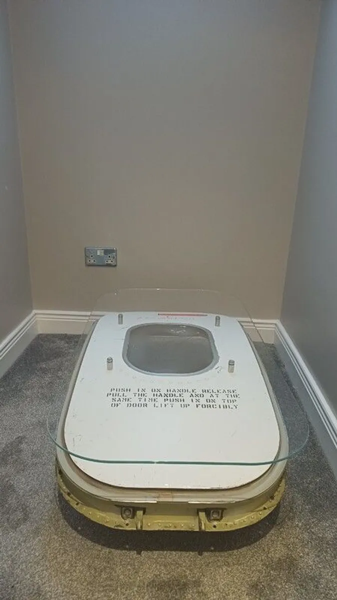 Coffee Table Crafted from an Upcycled McDonnell Douglas MD-83 Aircraft Emergency Exit Door - Image 4