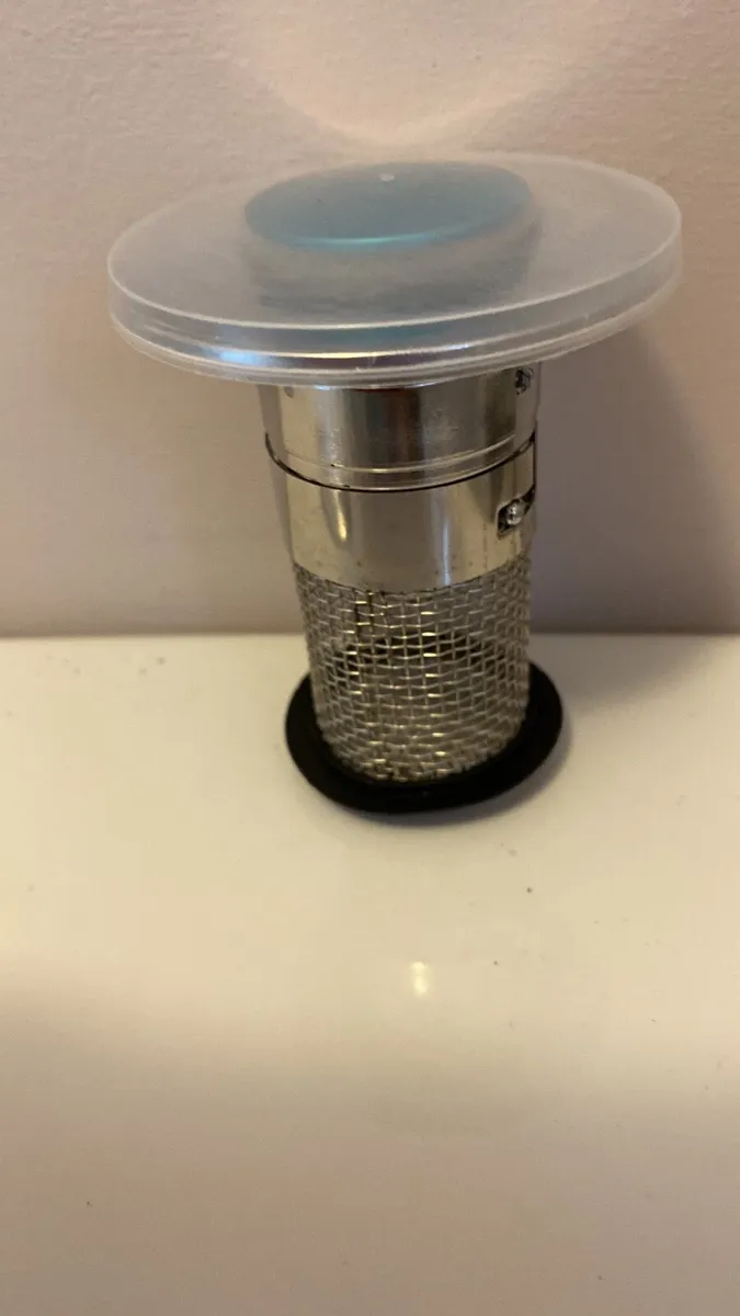 Pop up sink stoppers - Image 1