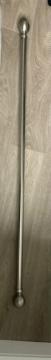 Silver curtain pole