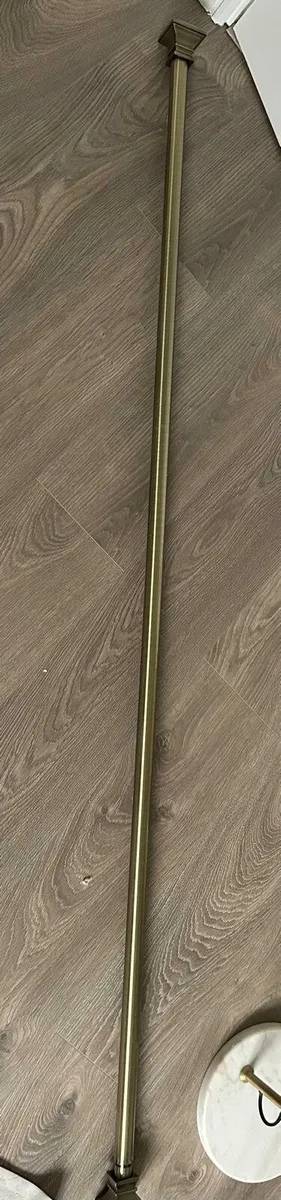 Gold curtain pole