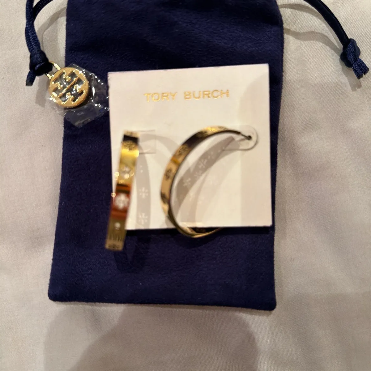 Tory Burch gold earrings unworn - Image 1