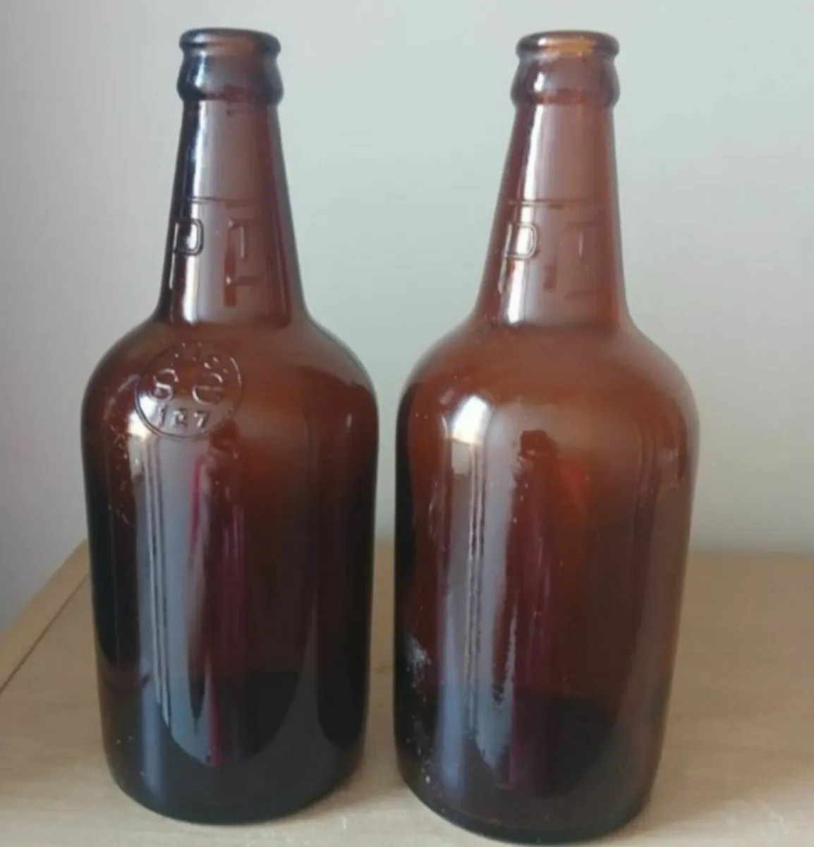 2 FAT OZ  GUINNESS BOTTLES
