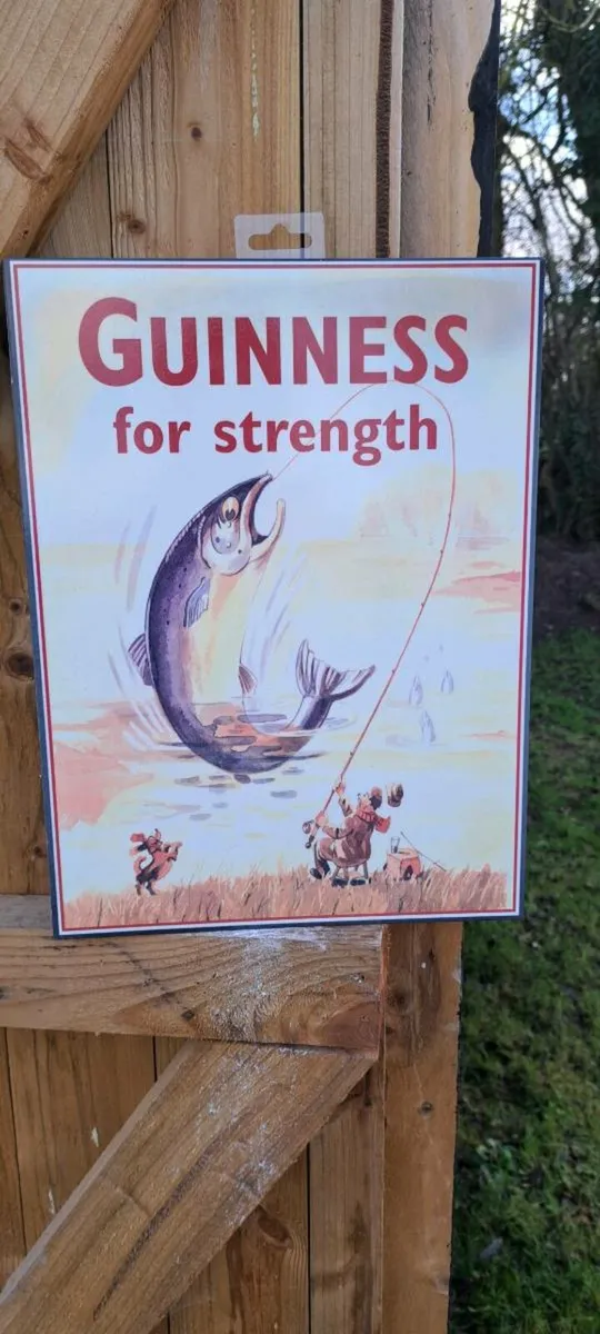 Large   fish  mid size metal sign