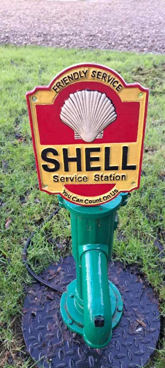 Shell cast iron sign