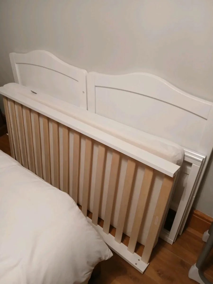Cot in good condition.  baby chair - Image 1