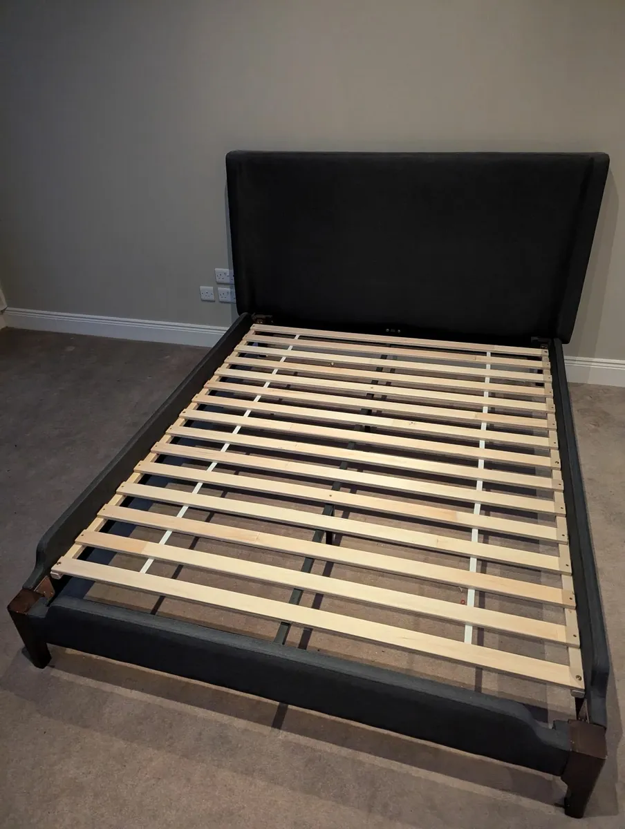 Harvey Norman upholstered king bed dark grey