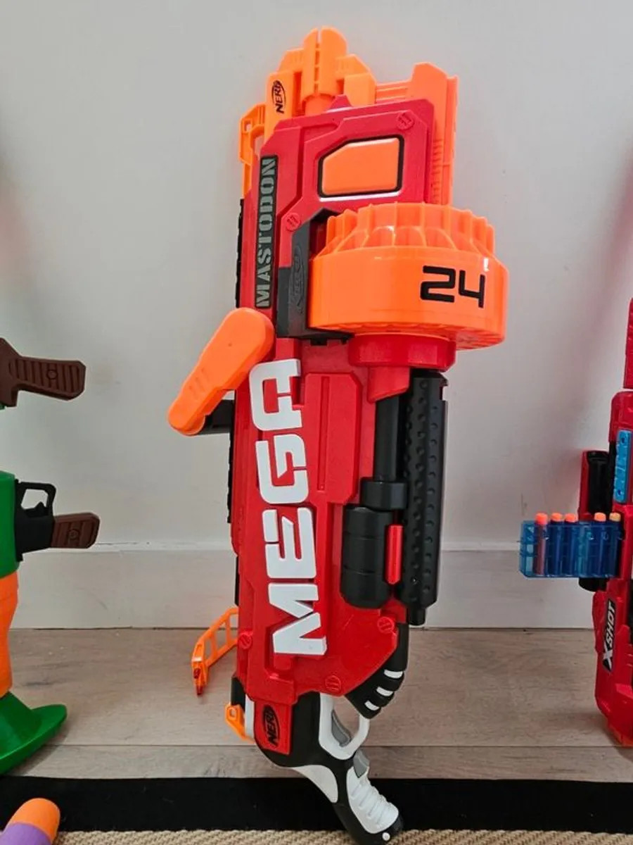 Collection of Nerf Guns, ammunition vests, safety goggles and Fortnite guns. - Image 2