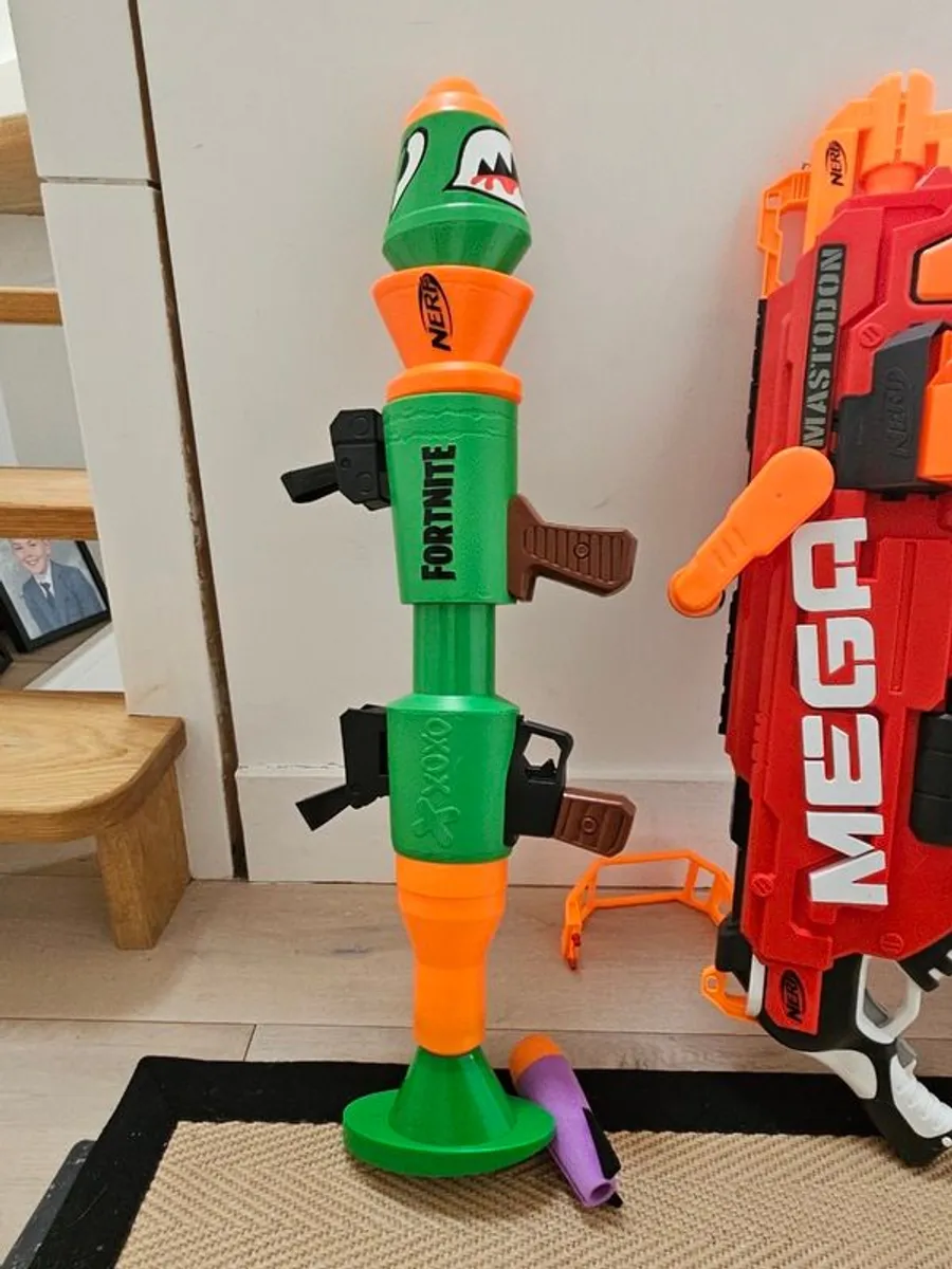 Collection of Nerf Guns, ammunition vests, safety goggles and Fortnite guns. - Image 3