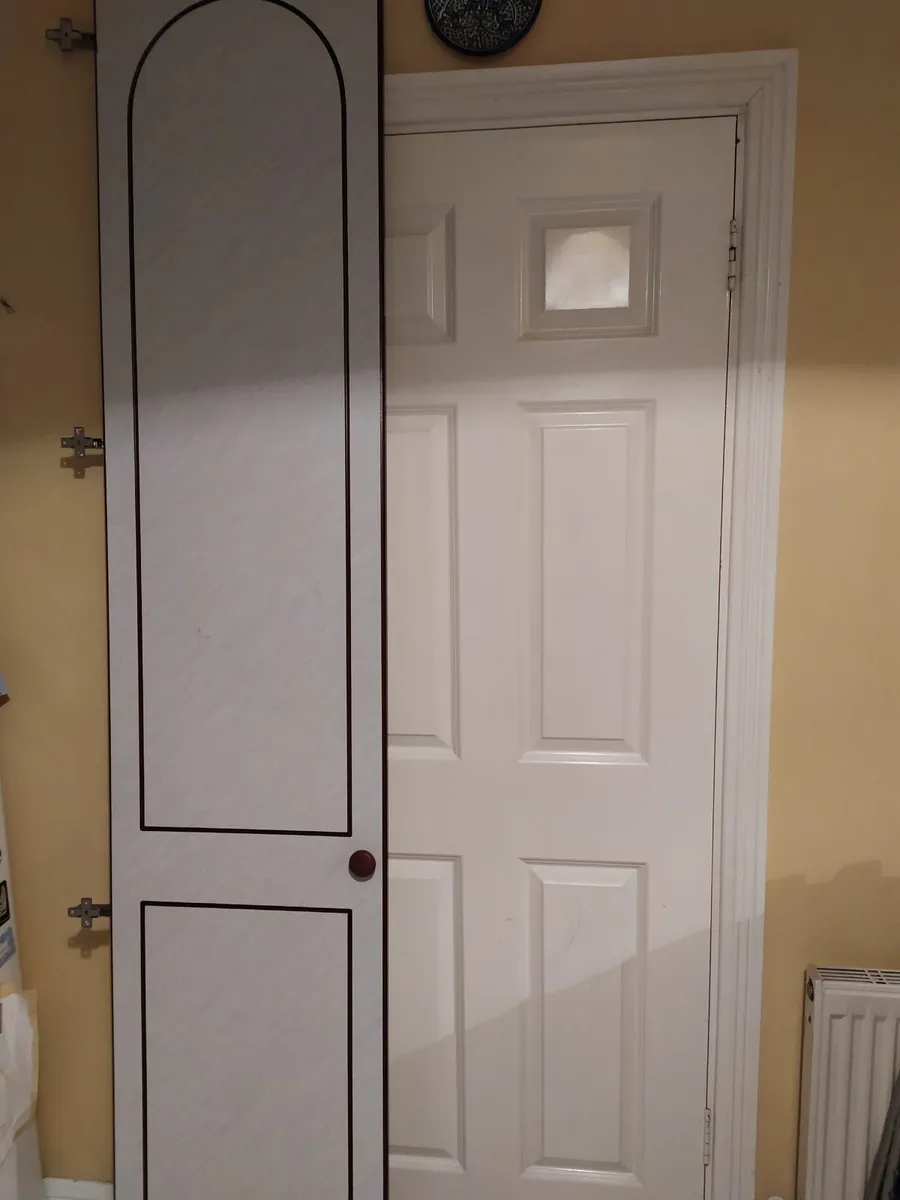 Two wardrobe doors and one chest of drawers - Image 1