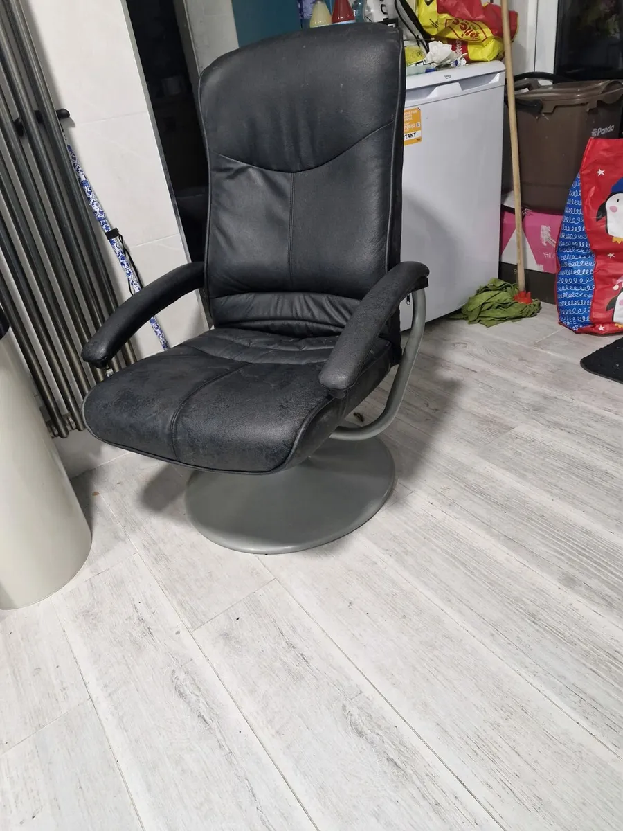 Two   Black Leather Swivel Chairs