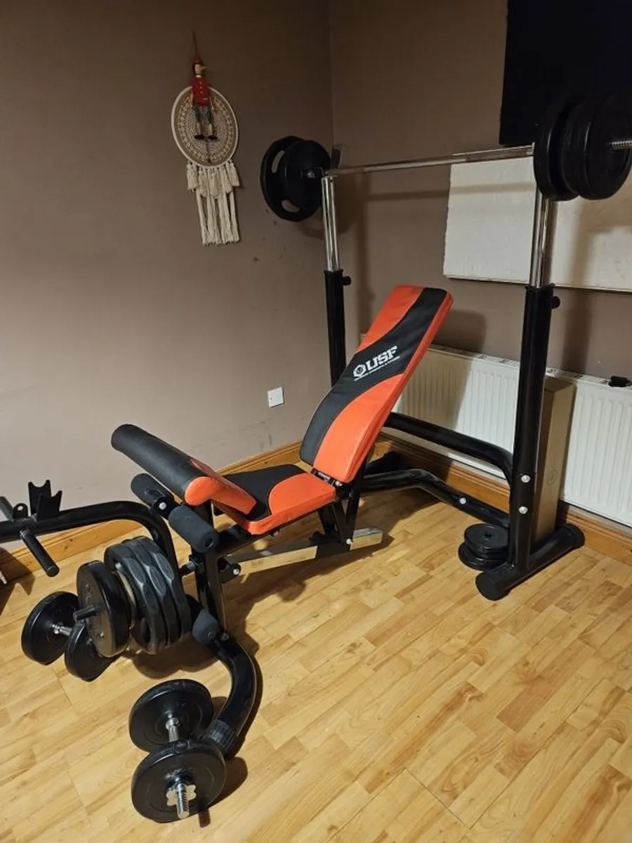 a bench and weights - Image 2