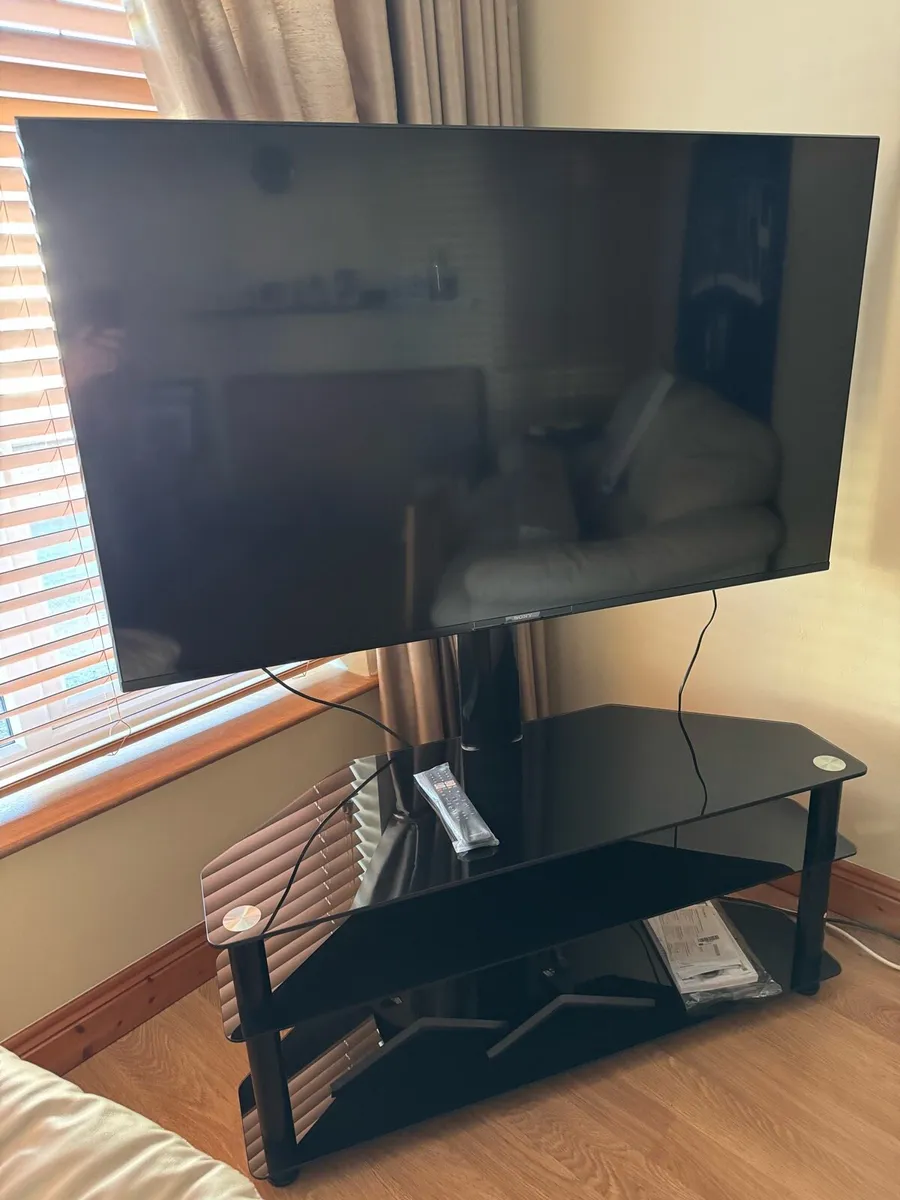 Sony Bravia 55” 4K UHD TV with Stand - Image 1