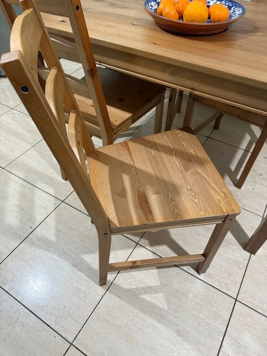 Dark stained pine table and 4 chairs. - Image 3