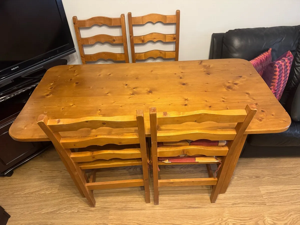 Pine table and six chairs - Image 1