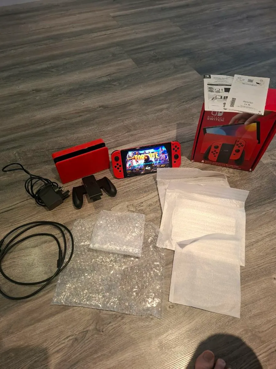 Red Nintendo Oled switch boxed. - Image 1