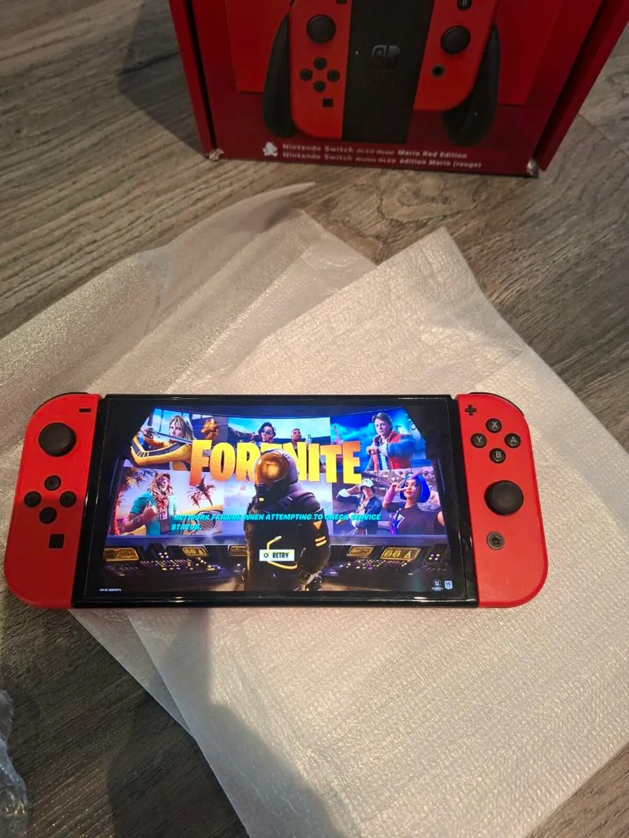 Red Nintendo Oled switch boxed. - Image 3