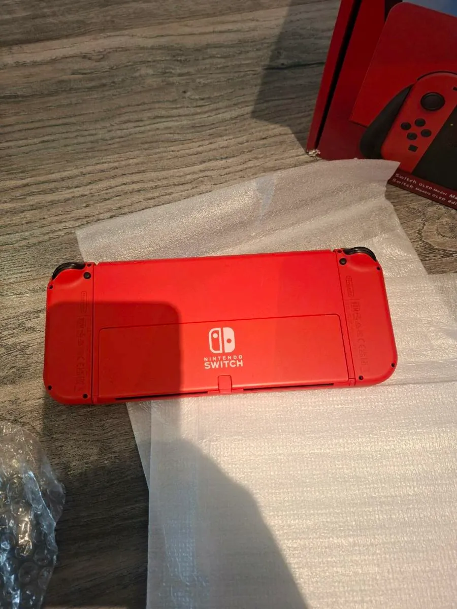 Red Nintendo Oled switch boxed. - Image 4