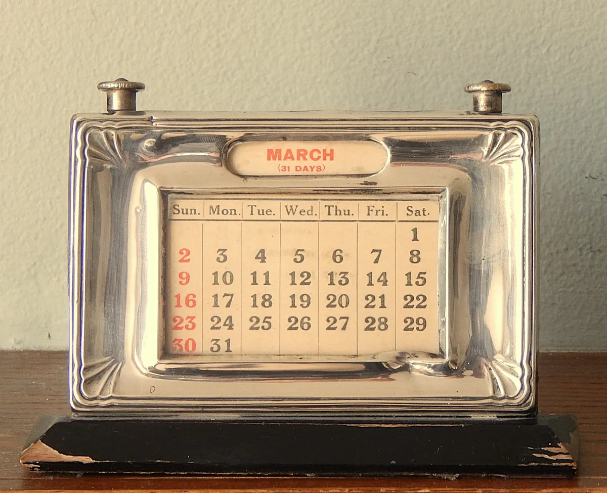 Mid Century Silver Perpetual Desk Calendar - Image 1
