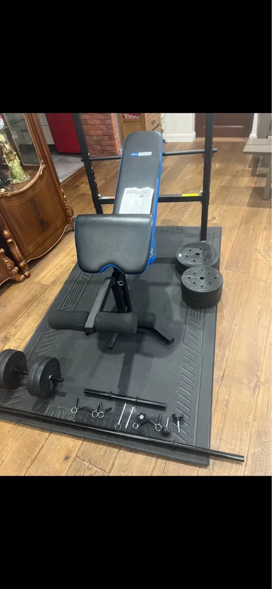 Bench barbell dumbbells and weights - Image 1