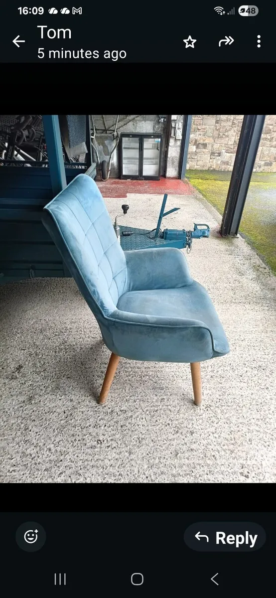 Blue velvet armchair