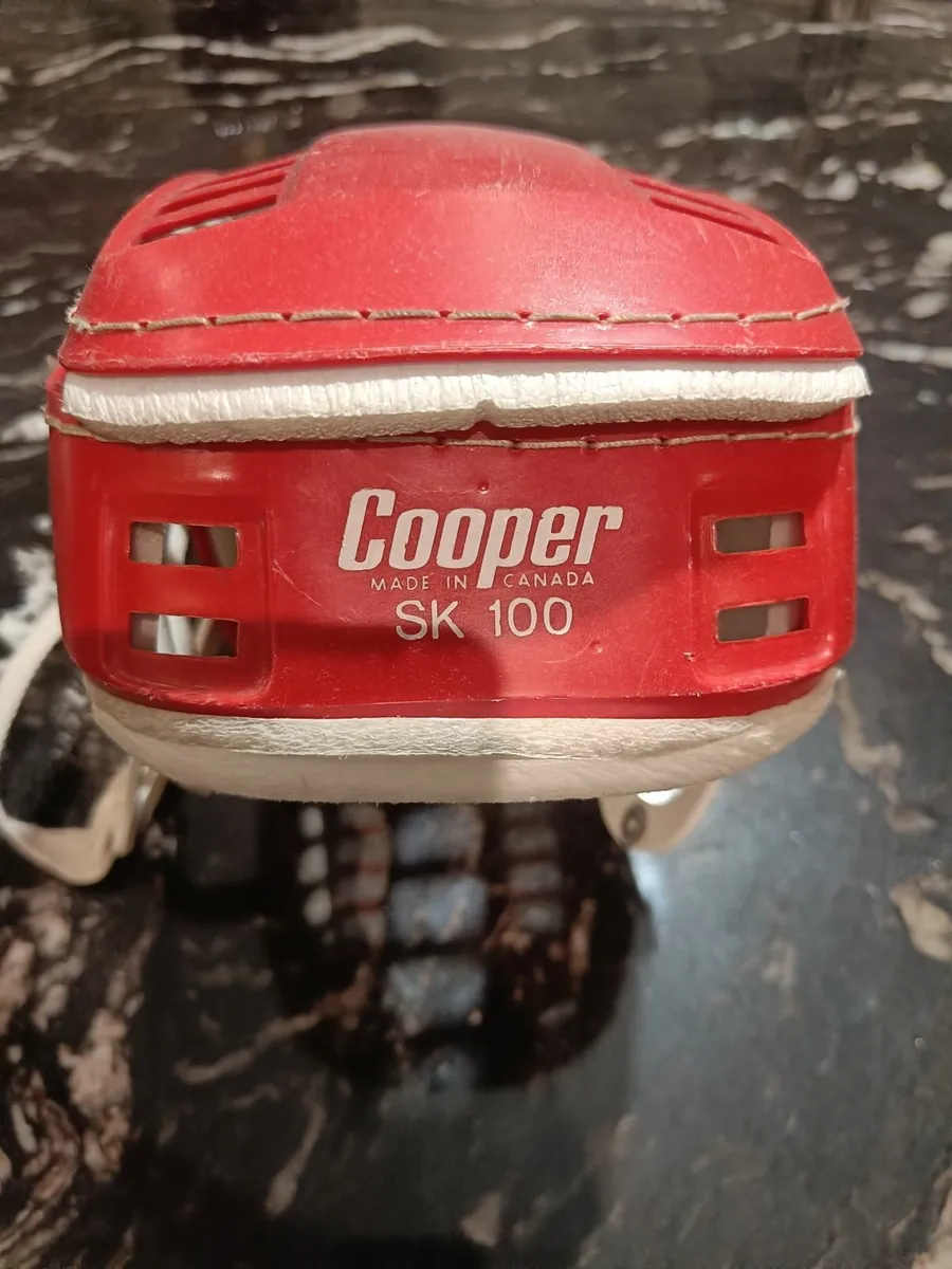 Red SK100 Cooper Hurling Helmet - Image 1