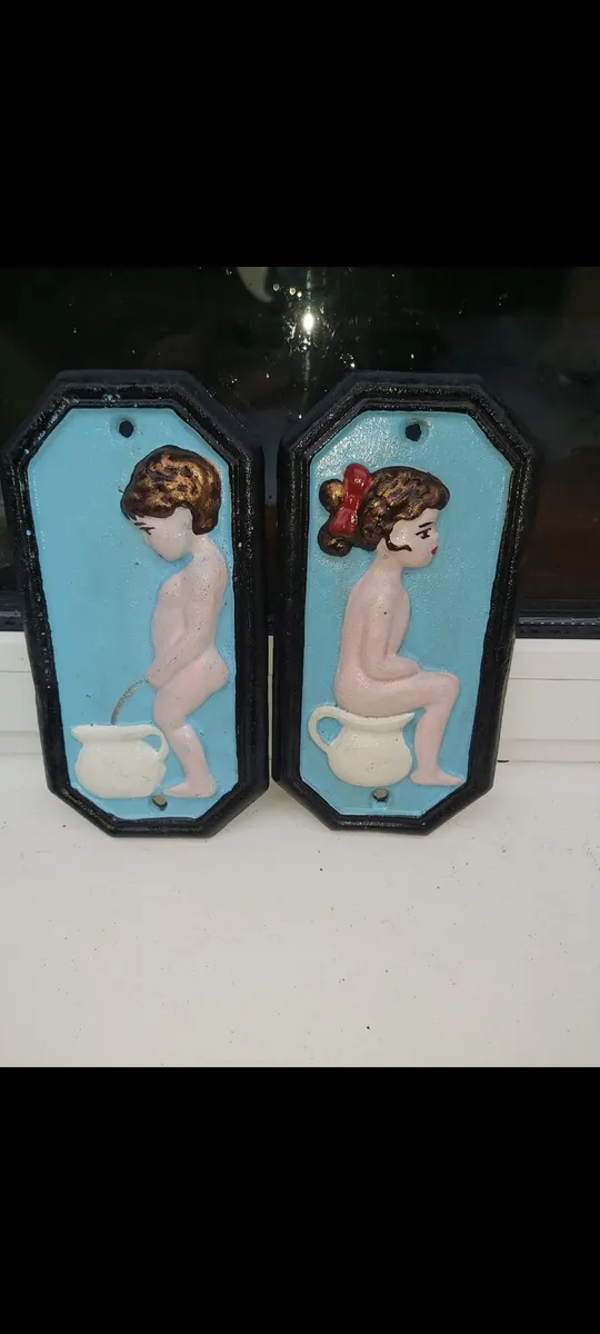 His hers  cast  iron  toilet signs