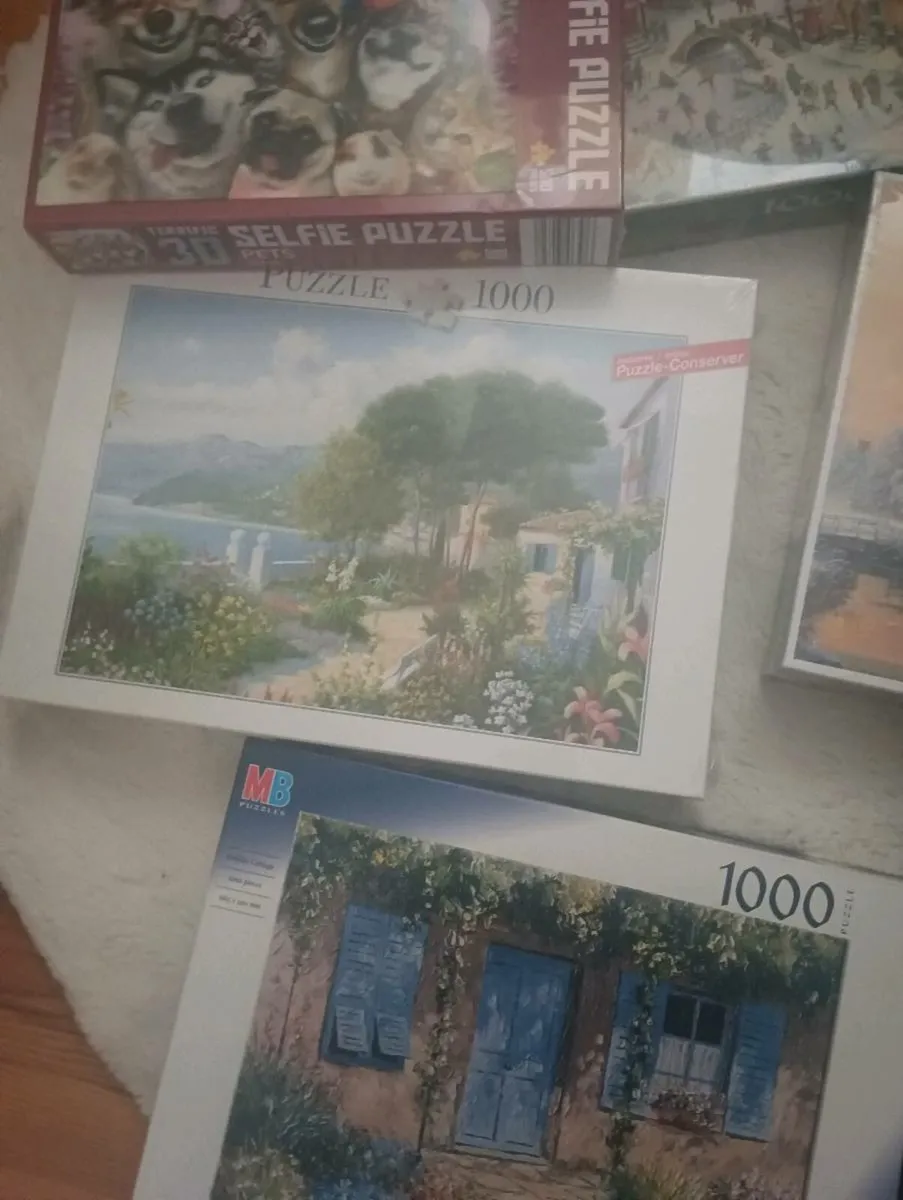 Lot all new puzzles,3 unopened 4 opened all ther. - Image 4
