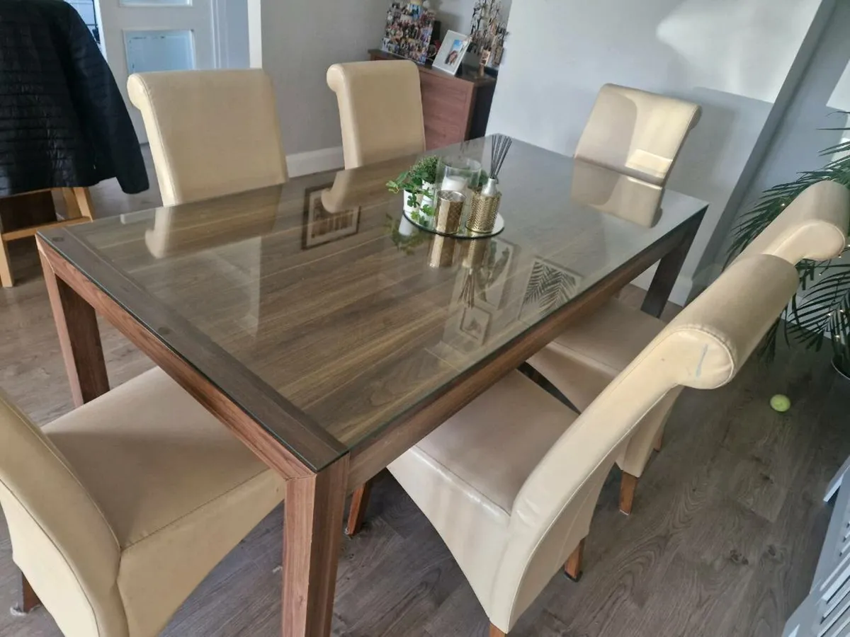 Glass top table and 6 chairs - Image 1