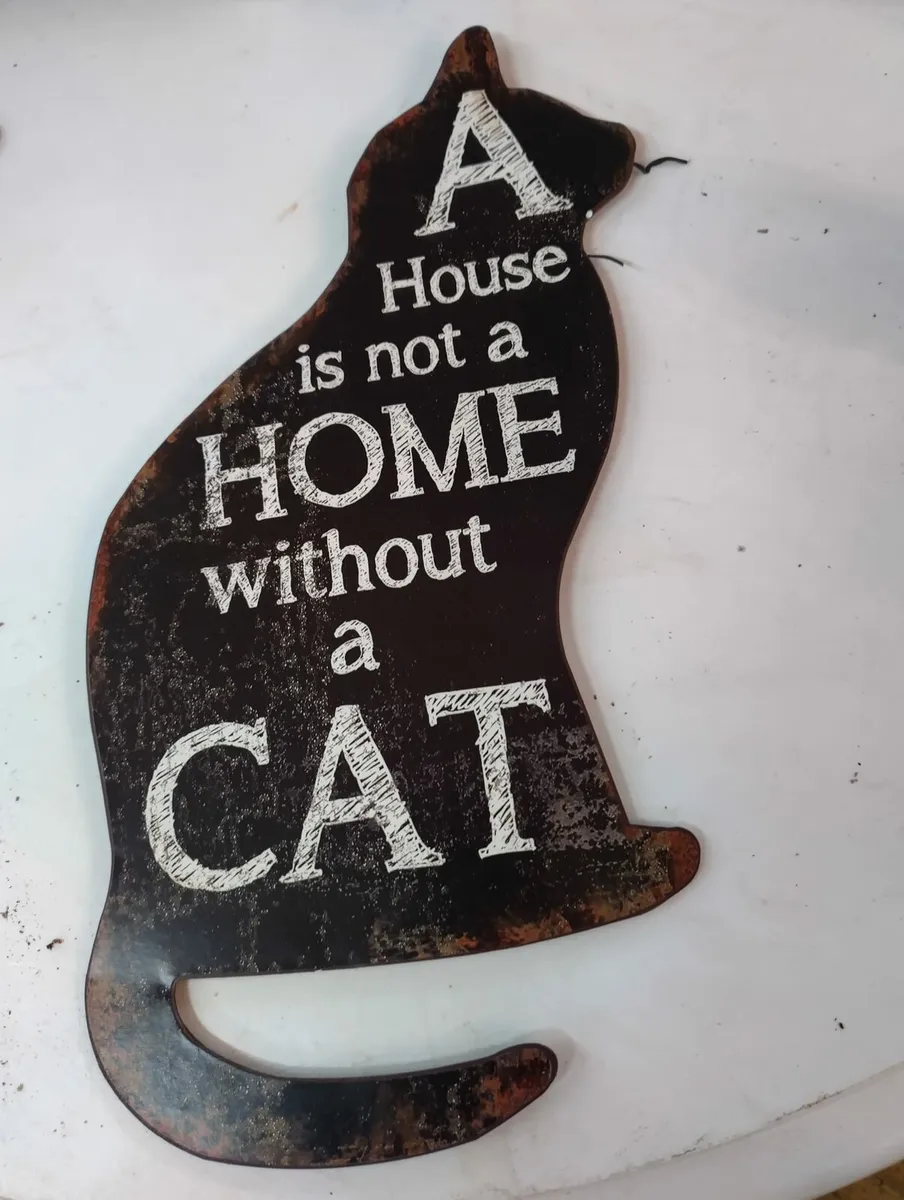 Metal cat sign