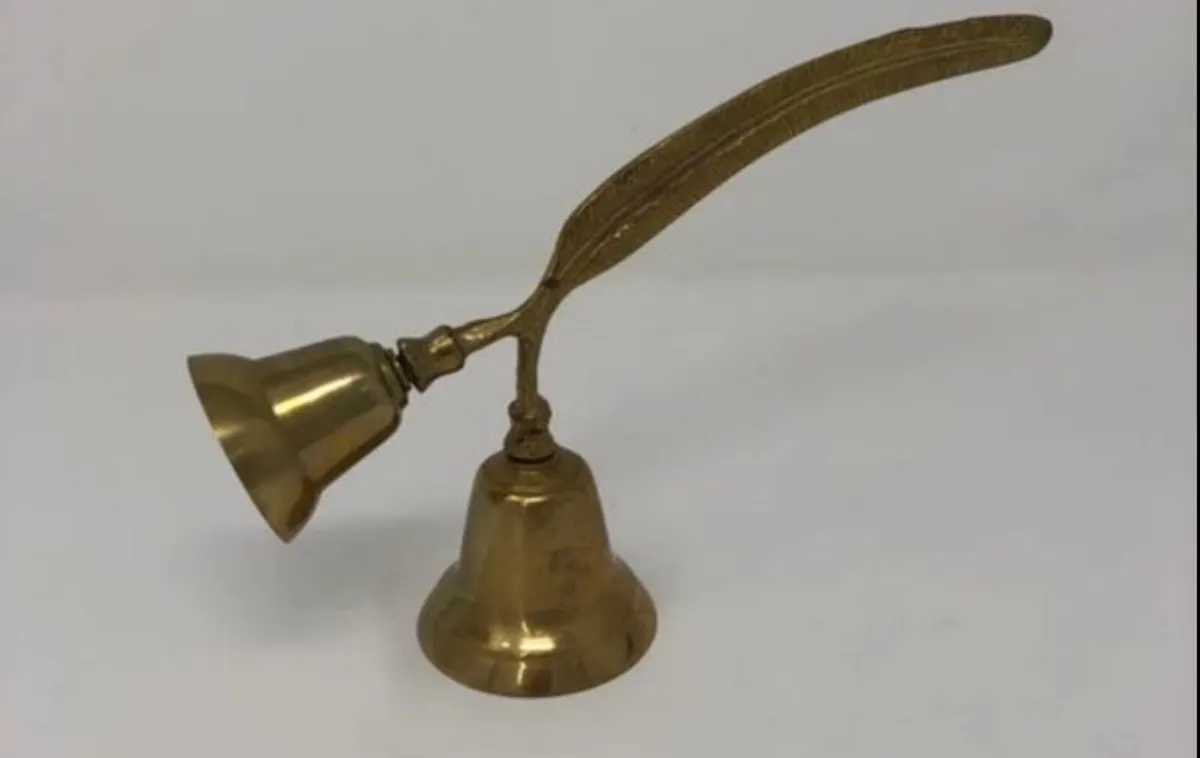 Vintage brass double bell with feather handle