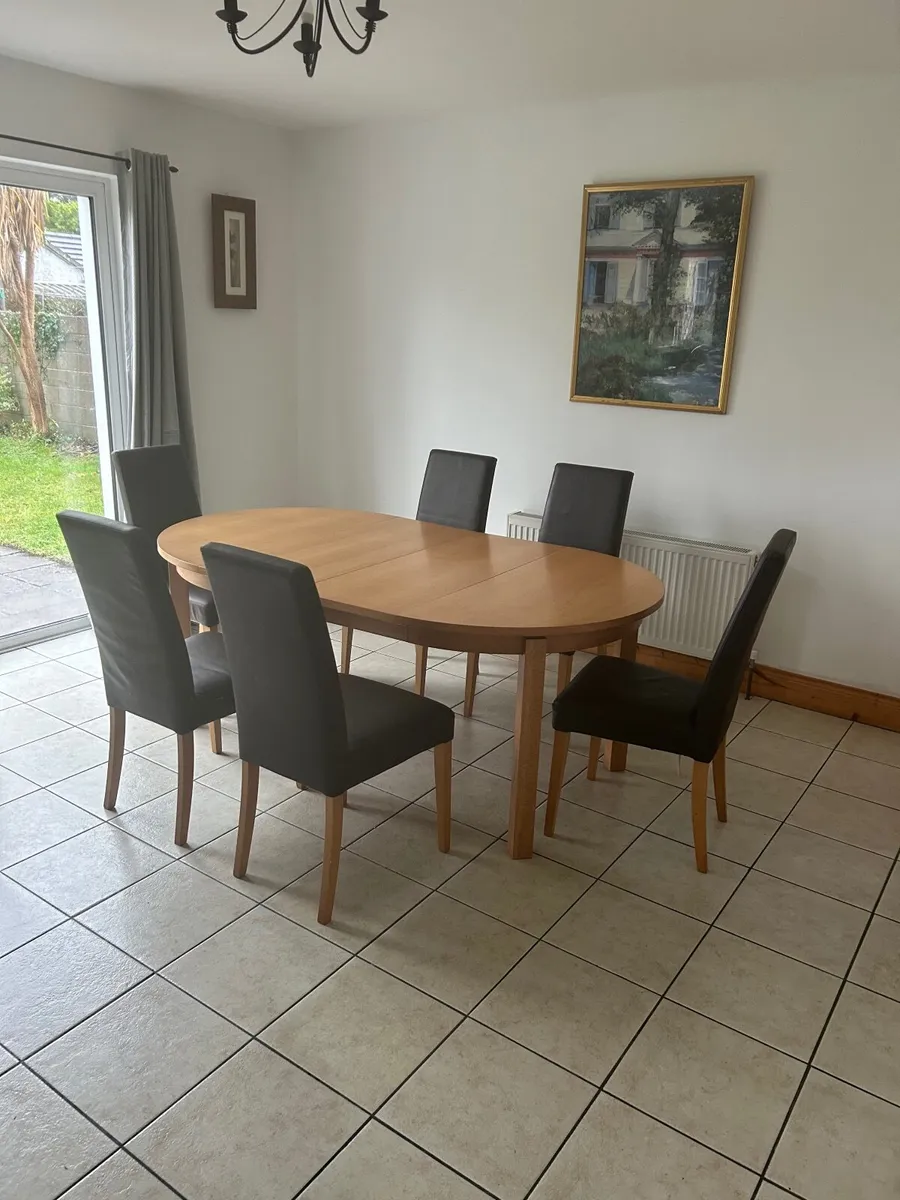 Dining Table and 6 Faux Leather Chairs - Image 1