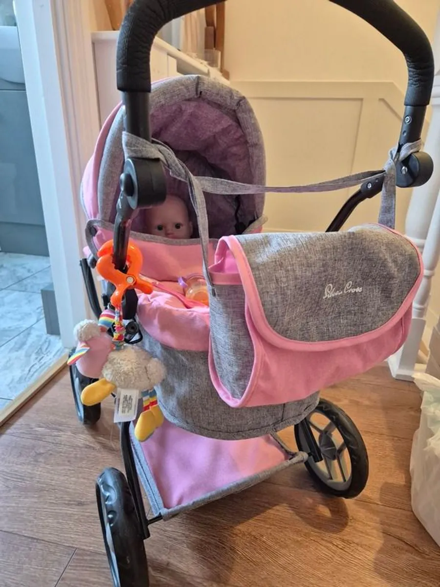 Doll and pram - Image 1