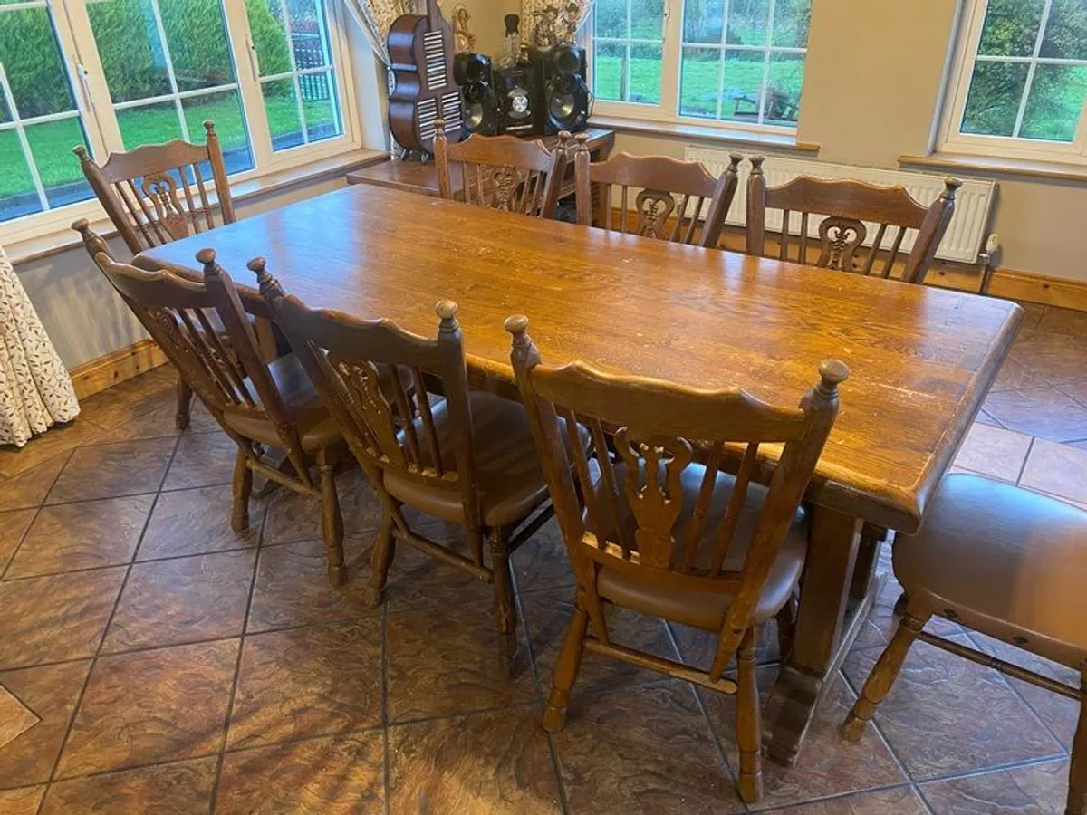 Solid oak kitchen table and 10 chairs!! - Image 1