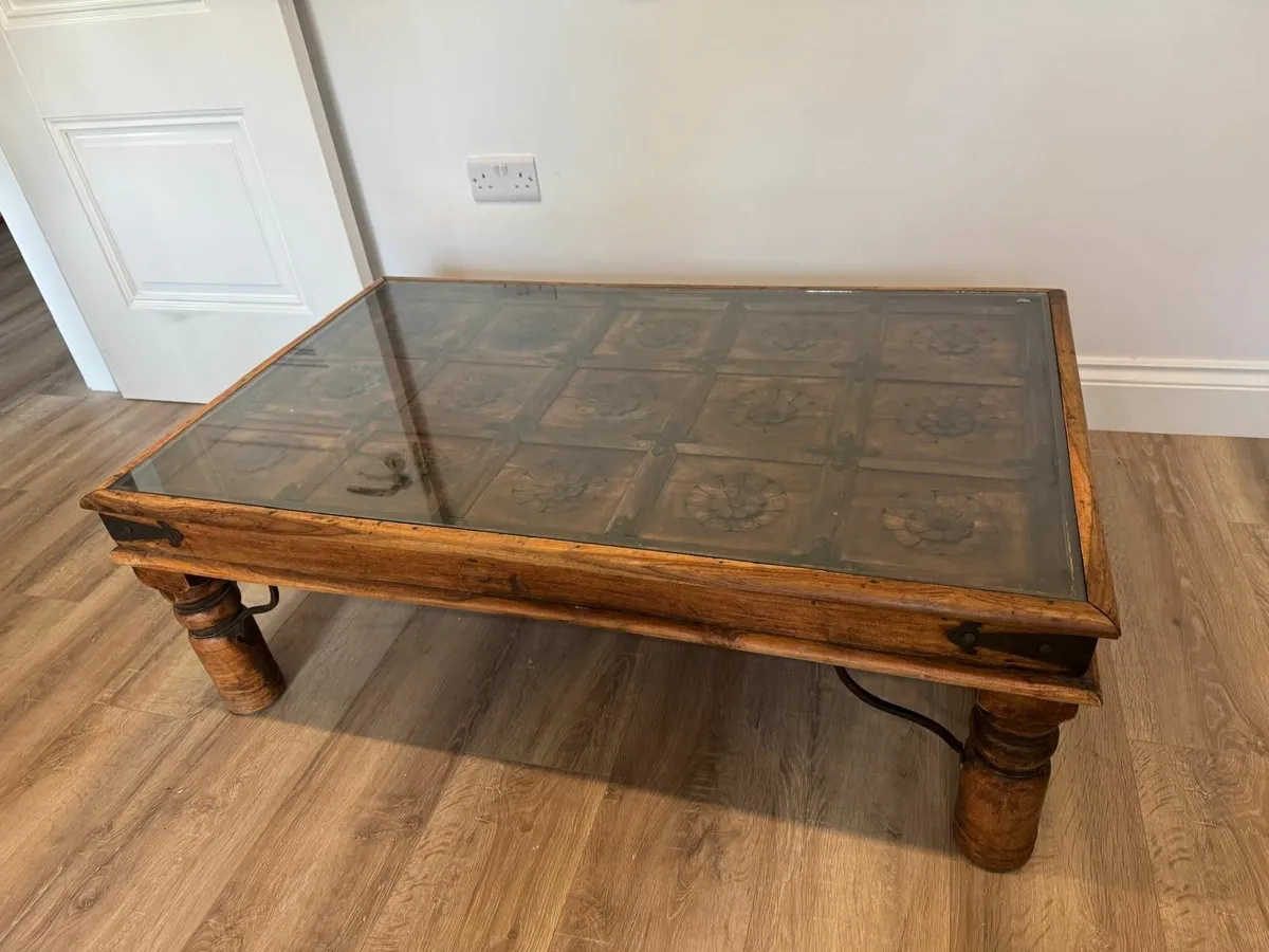 Hand Carved Wooden Coffee Table with Glass Top - Image 1