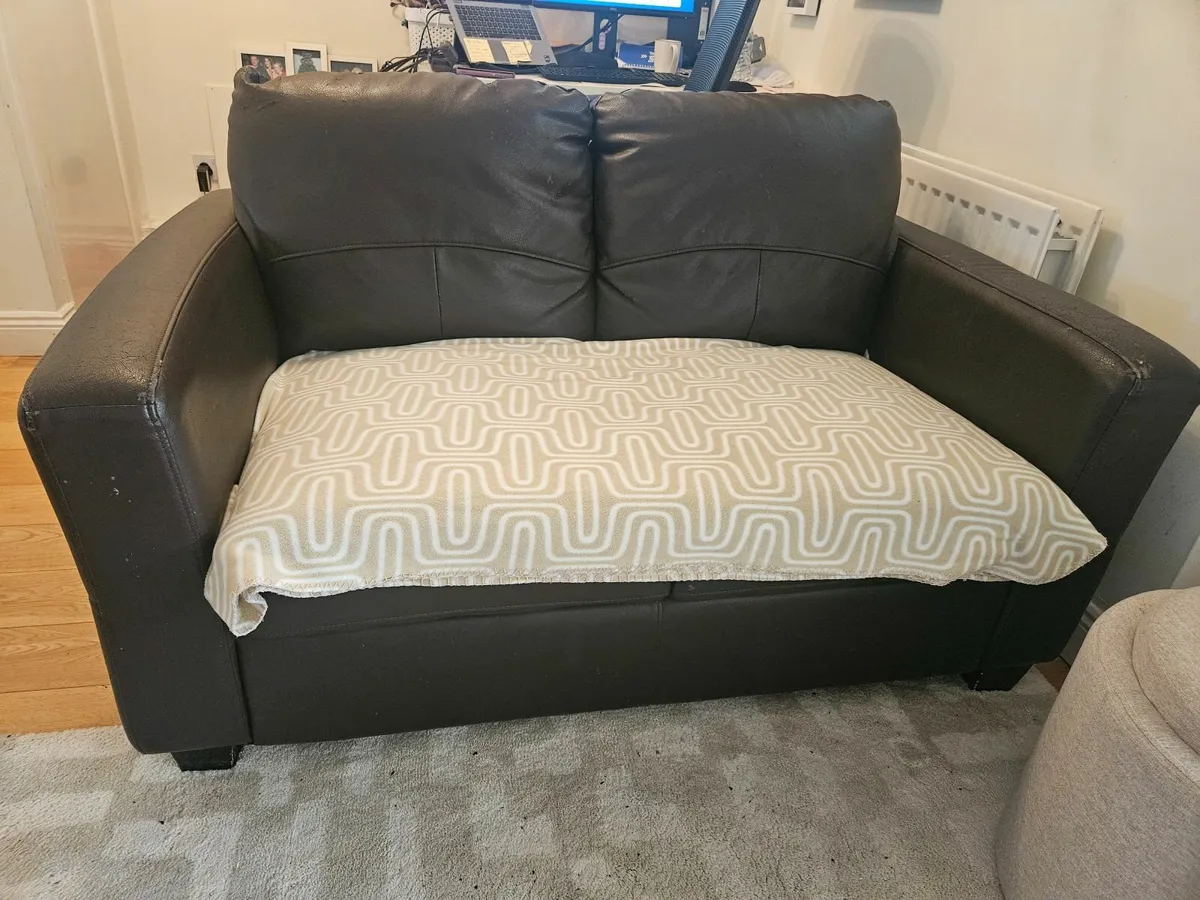 Free dark brown leather couch - Image 1