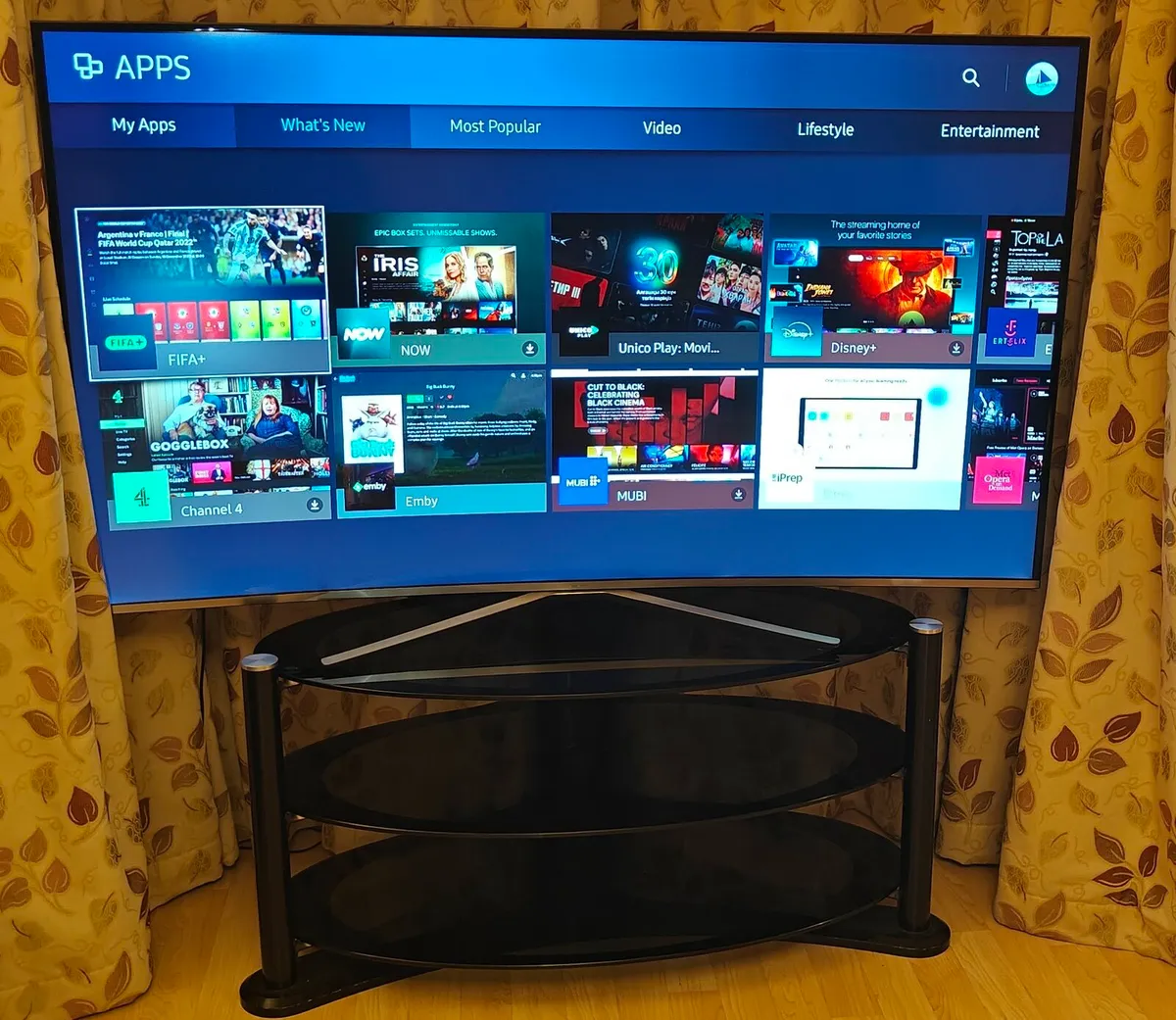 Samsung 55" Smart TV with TV Stand - Image 1