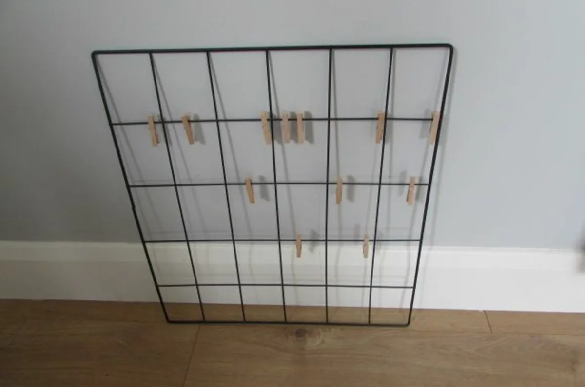 Black Metal Wall Grip with Wooden Pegs for Sale - Image 1