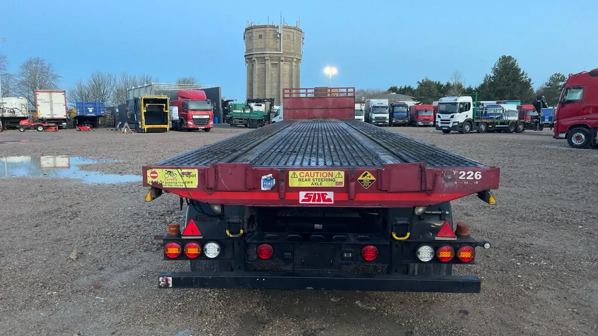 2015 SDC Flat Trailer Rear Steering axle Lift Axle - Image 3