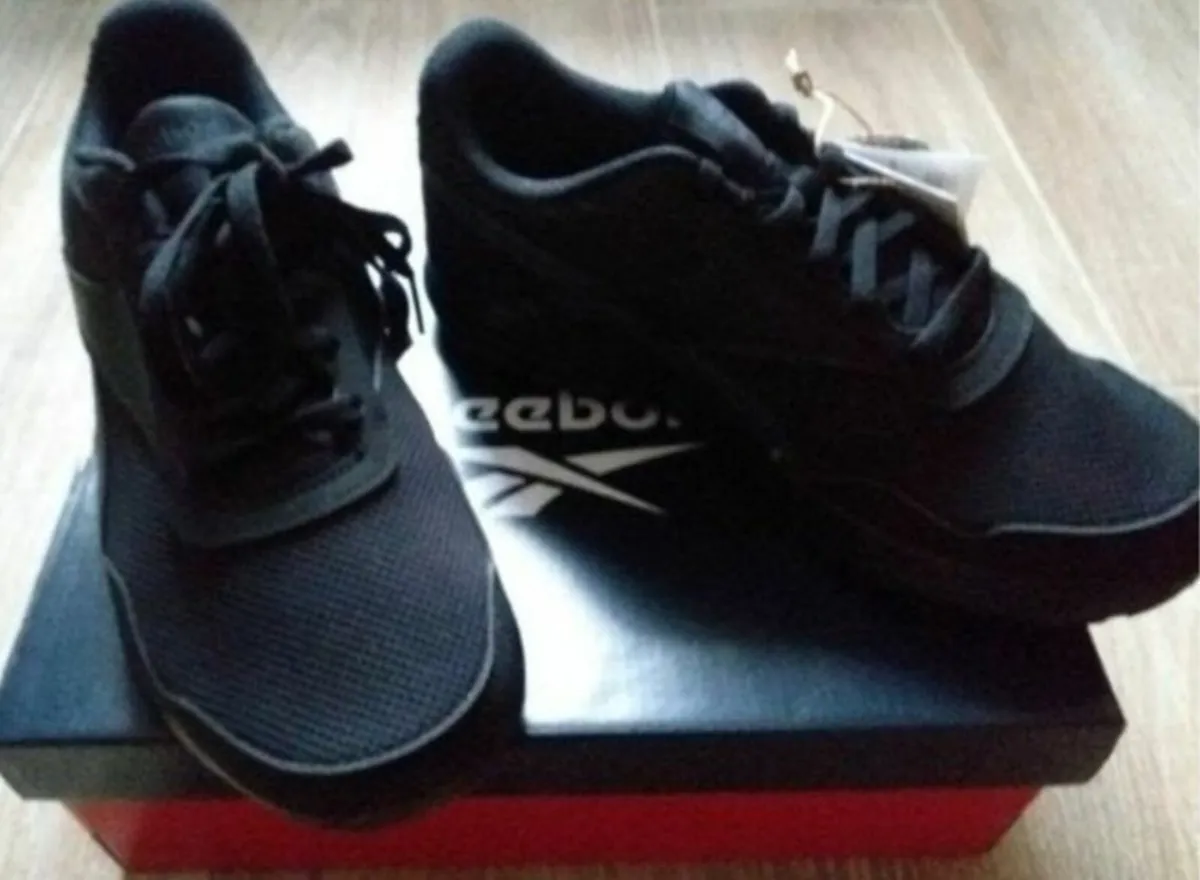 Brand new in box.  Reebok Black Trainers.  UK5 - Image 1