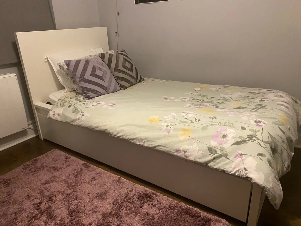 Ikea single bed with two storage drawers - Image 1