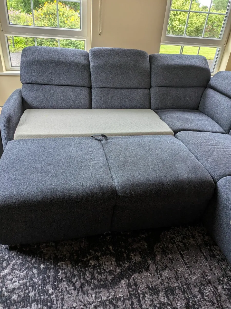 Corner couch with sofabed and storage - Image 3