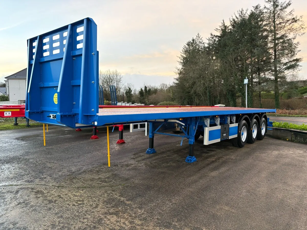 New Unused 37 ft Moffett Mounty Flat Trailer - Image 1