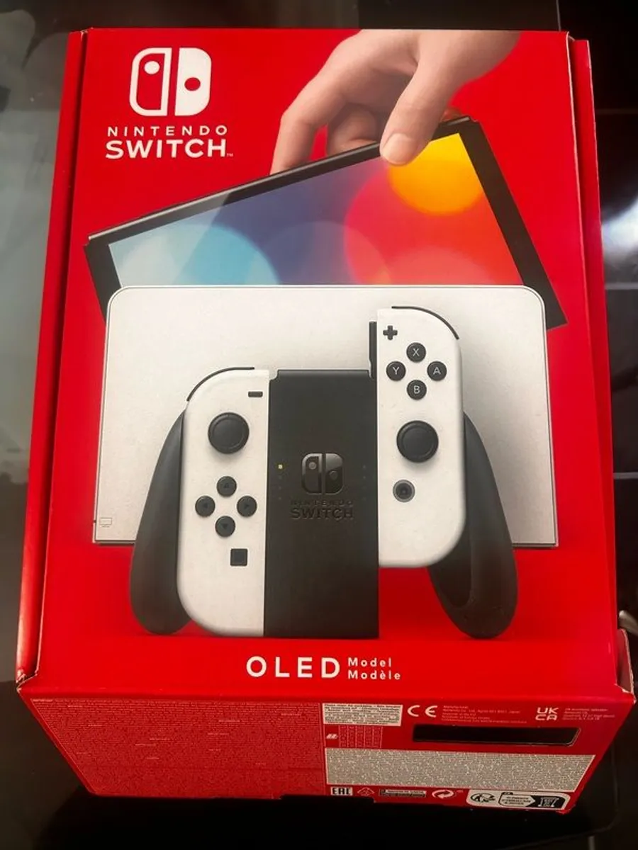 nintendo switch oled 64gb with game - Image 1