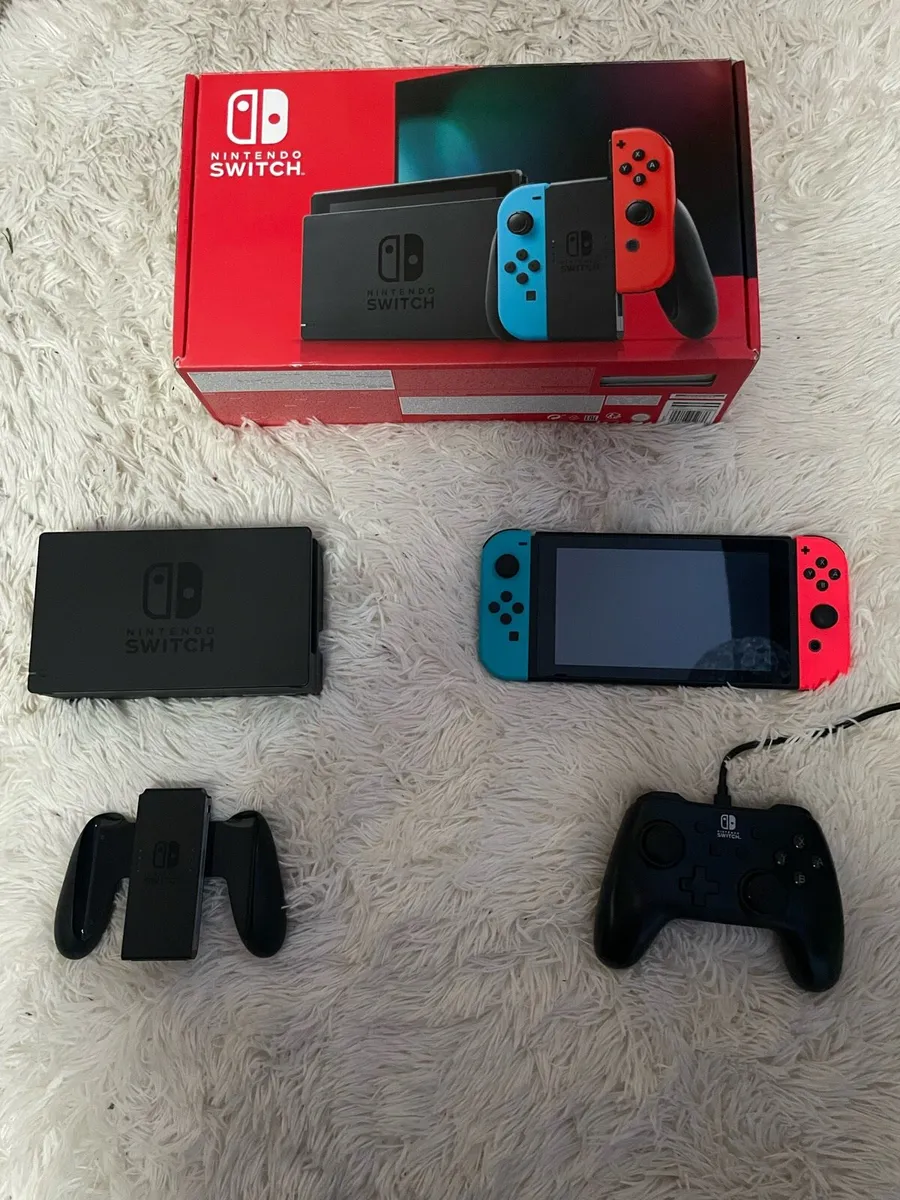 Nintendo switch with games - Image 1