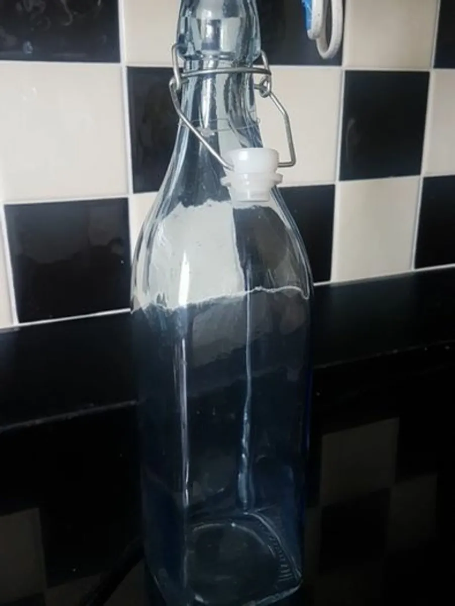 Glass bottle with cup new